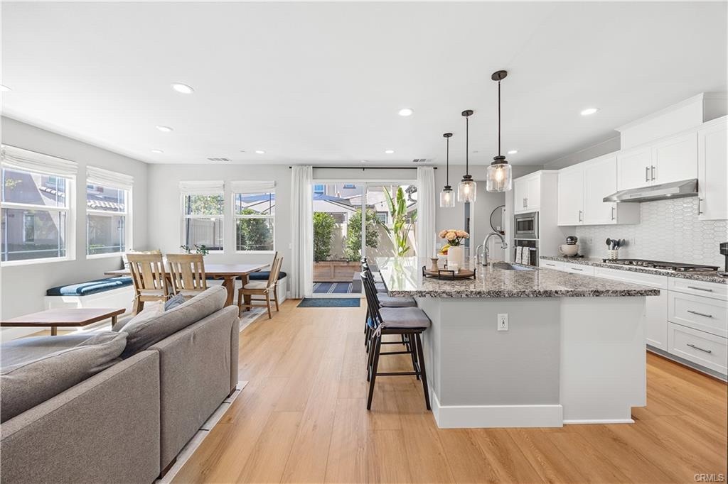 Bright kitchen and dining space at 32672 Brunello Way